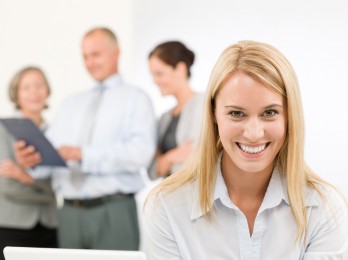 Business woman pretty with colleagues discussing